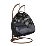 Hangstoel Dubai zwart met goud frame en dusty blue kussen 
