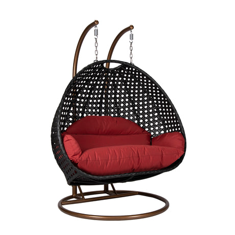 Hangstoel Dubai zwart met goud frame en rood kussen 